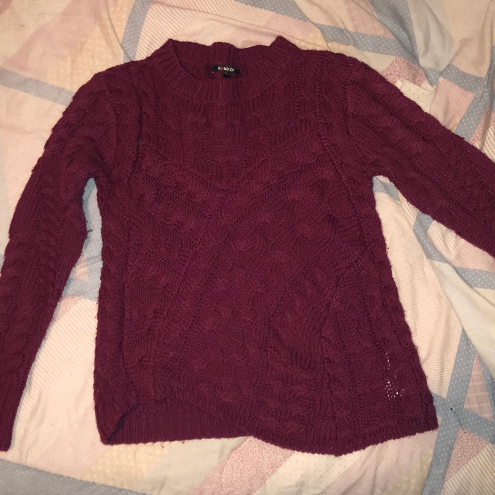 Long sleeved sweater.